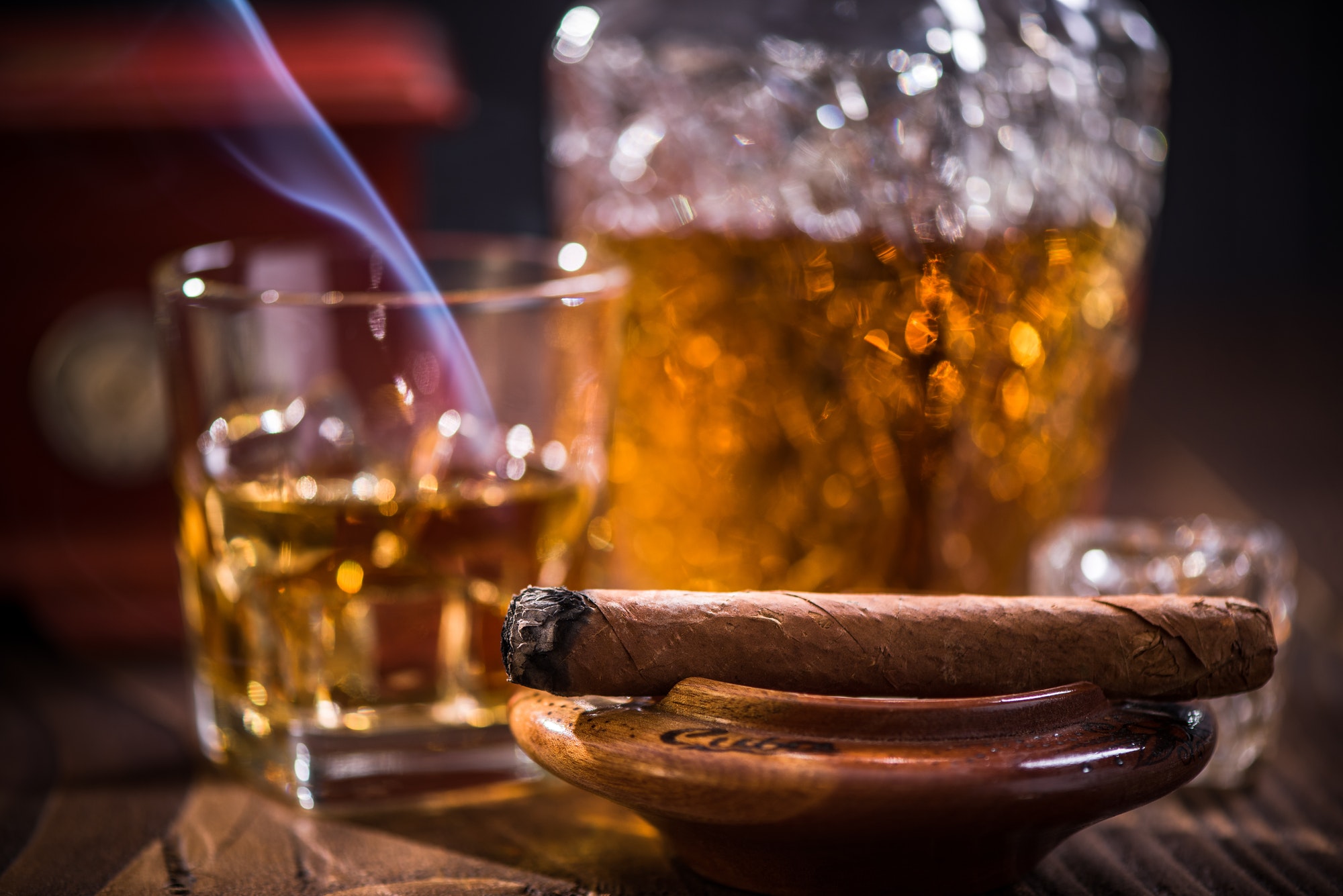 Luxurious smoking cuban cigar in ashtray